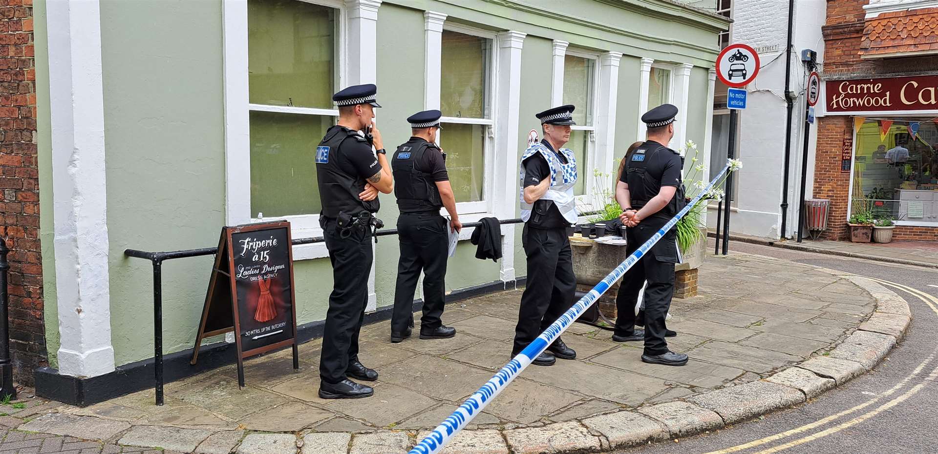 There is a strong police presence in The Butchery, Sandwich following the death of two people