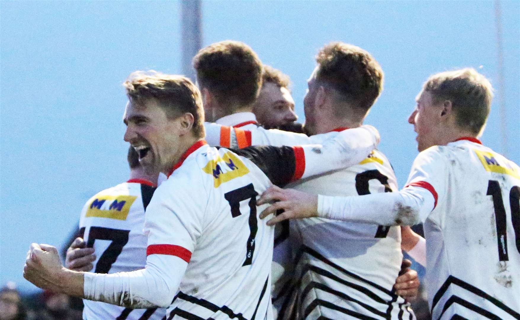 Tom Chapman leads Deal celebrations in Saturday’s 2-0 FA Vase win against Cobham. Picture: Paul Willmott