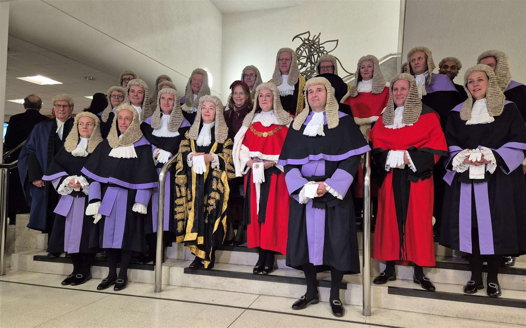 The judiciary and dignitaries at the 40th anniversary celebrations of the Maidstone Combined Court Centre in Barker Road, including resident judge His Honour Julian Smith (third right) and the Lady Chief Justice of England and Wales, Baroness Carr of Walton-on-the-Hill (centre, dressed in red). Picture: Julia Roberts