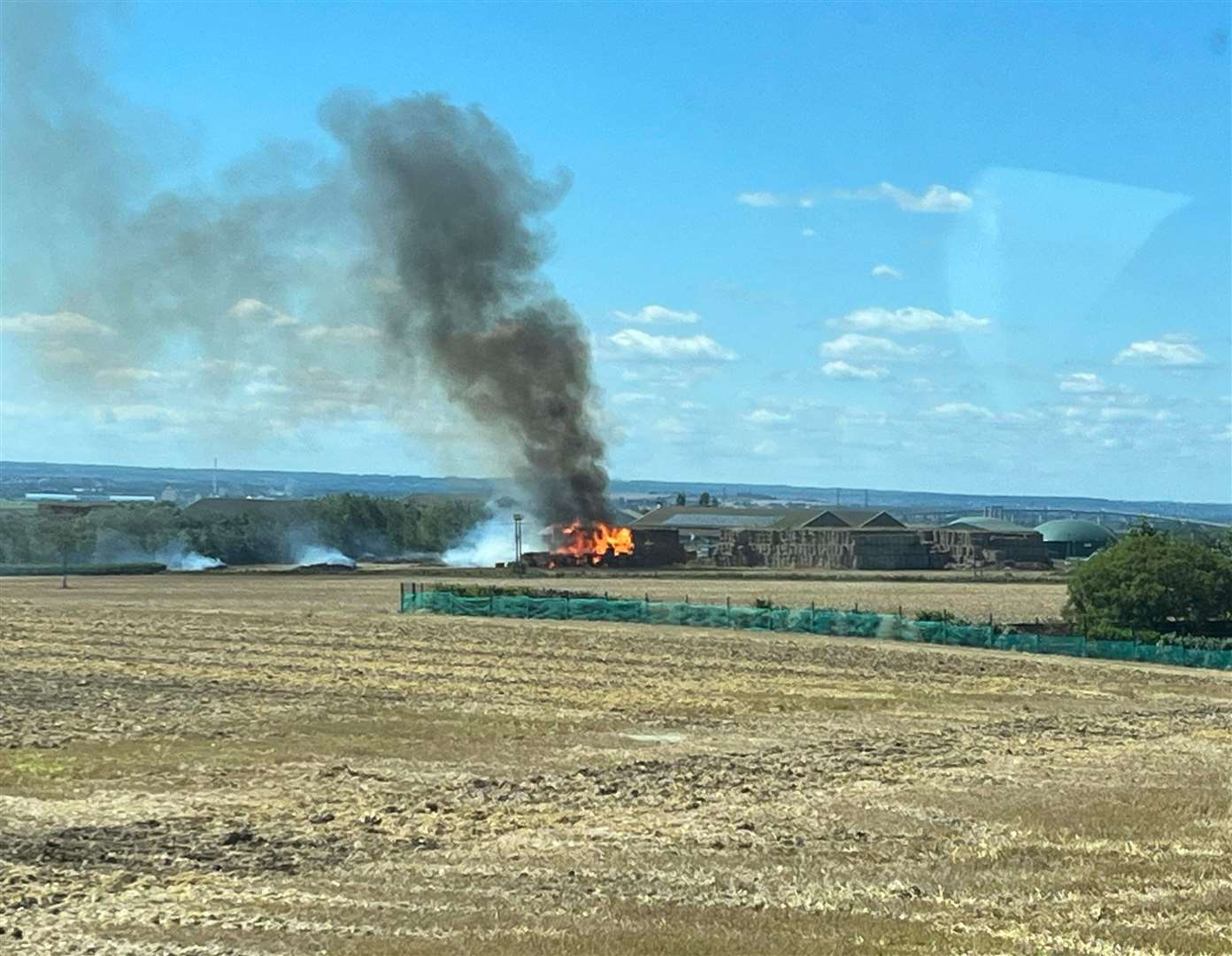 A haystack near the Brambledown farm shop has caught fire