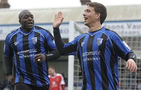 Adebayo Akinfenwa and Cody McDonald