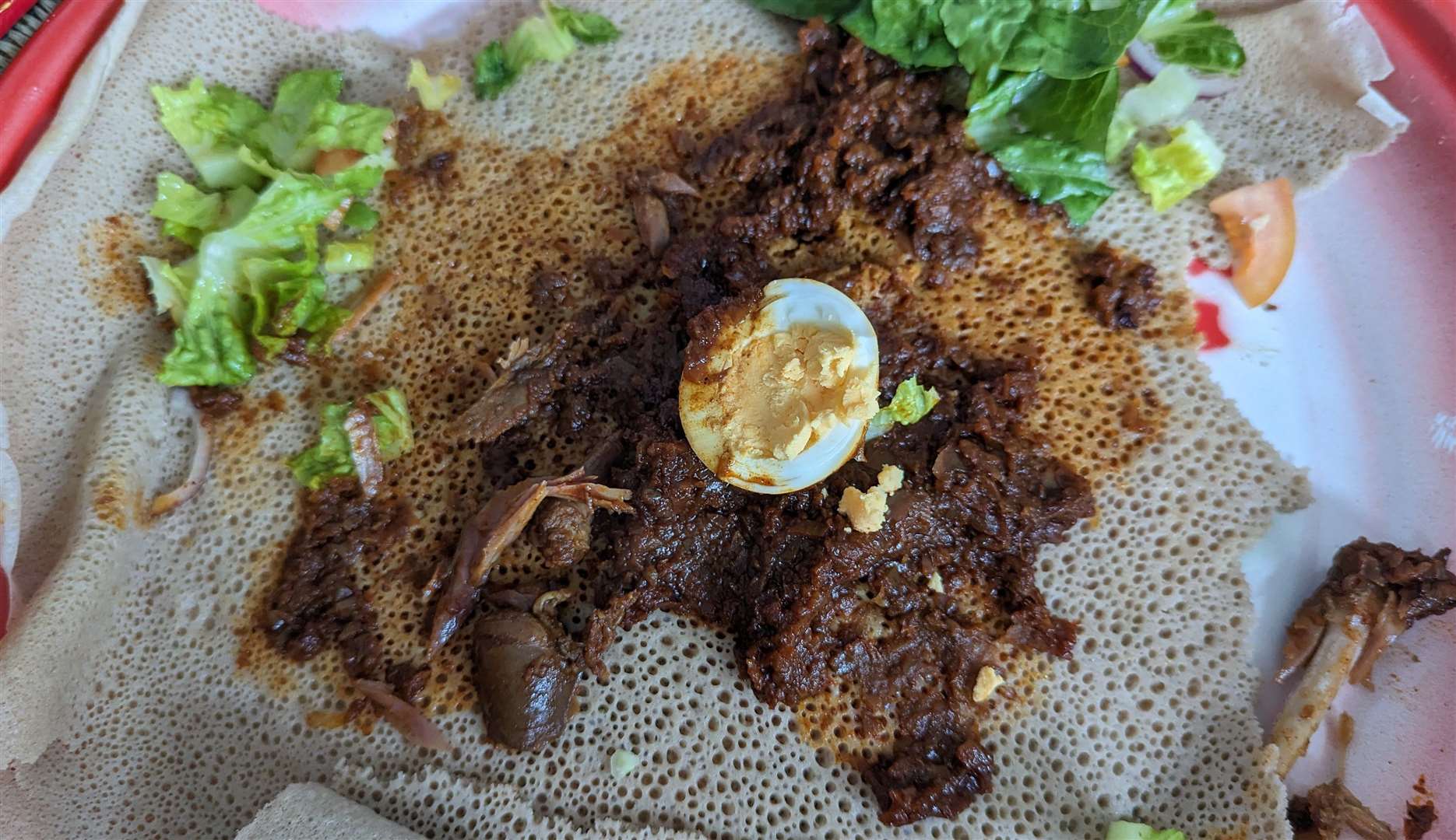 Zigni derho chicken stew served with injera bread