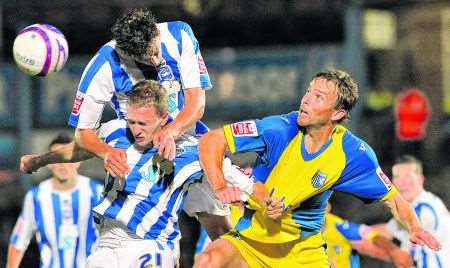 Gillingham battle it out against Brighton