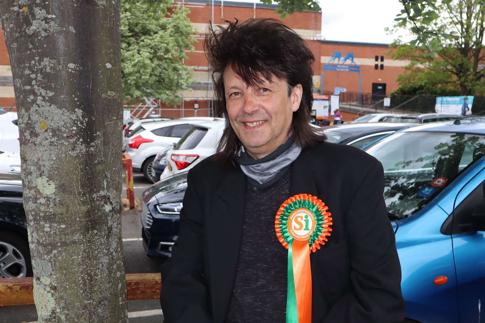 A smiling Mike Baldock (Independent) who won Swale West from Conservative Mike Whiting at the KCC count at the Swallows Leisure Centre, Sittingbourne