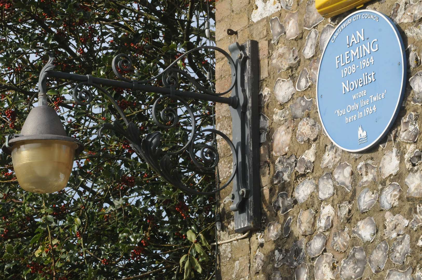 The blue plaque in honour of Ian Fleming on the outside of the The Duck Inn, Pett Bottom