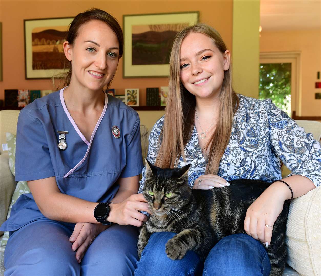 Cobweb back home in Westerham with owner Ella Clark, 19, and Mark Nelson head veterinary nurse Gemma Wade