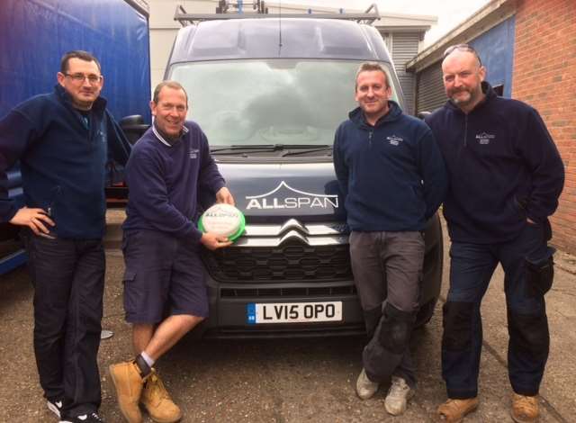 The Allspan team mark the 20th birthday of the company with a cake