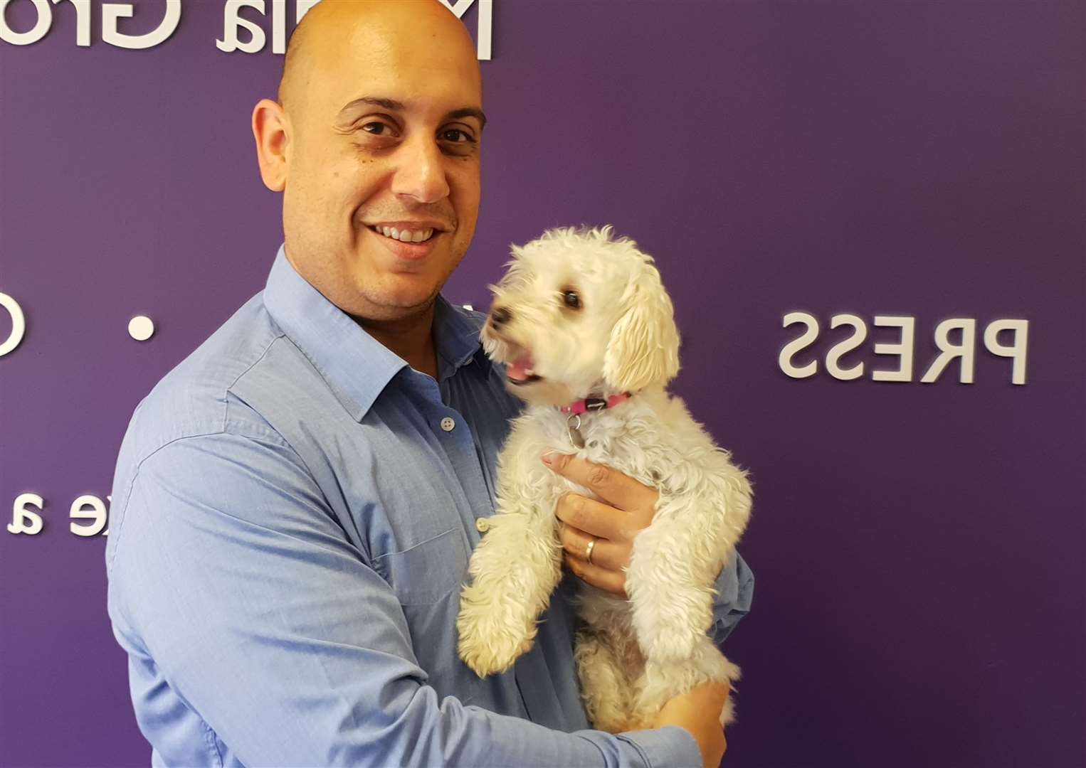 John Leonidou with Sandy in the KM Ashford office