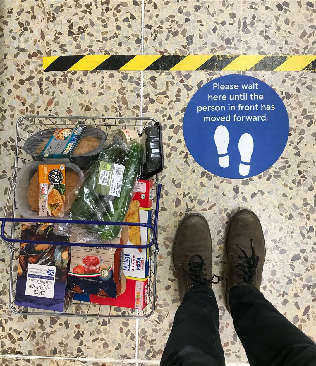 Social distancing markers are in place at Tesco stores (Aaron Chown/PA)