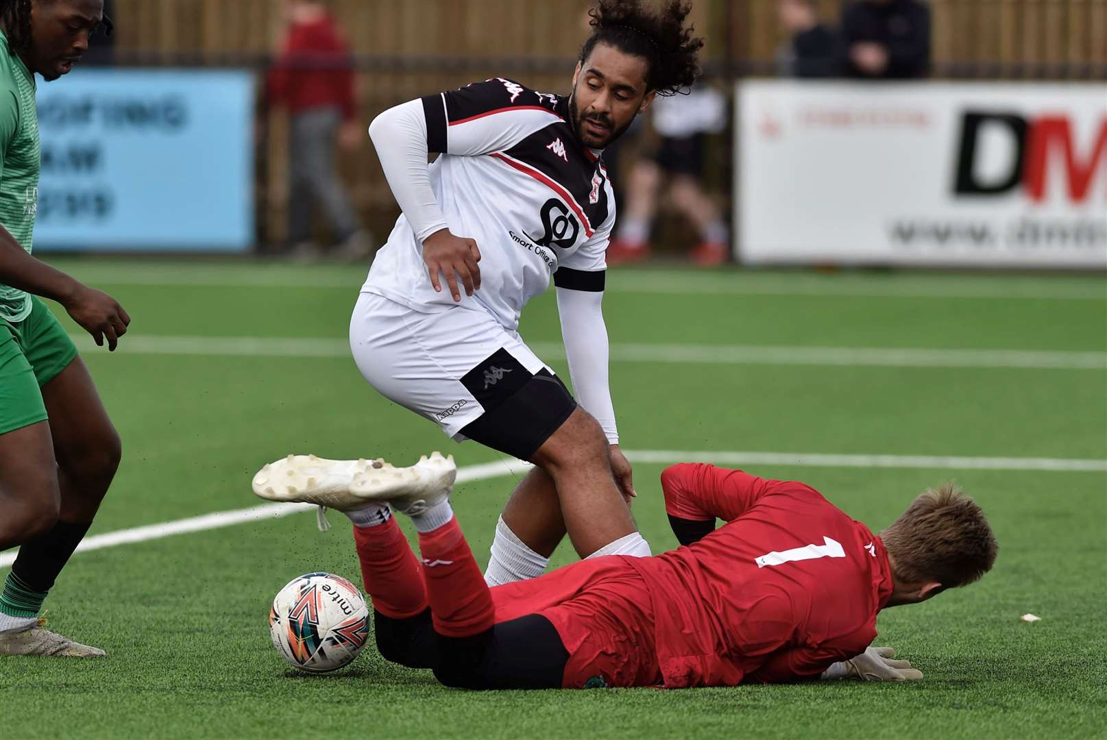 Faversham striker Stefan Payne challenges the Welling Town keeper. Picture: Ian Scammell