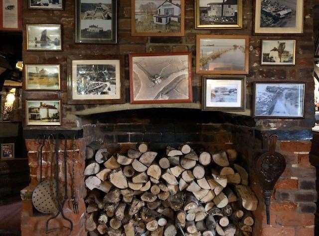 Full of fascinating unique items, the pub has some great photos. These, over the top of the log store, show the devastating flood of 2003.