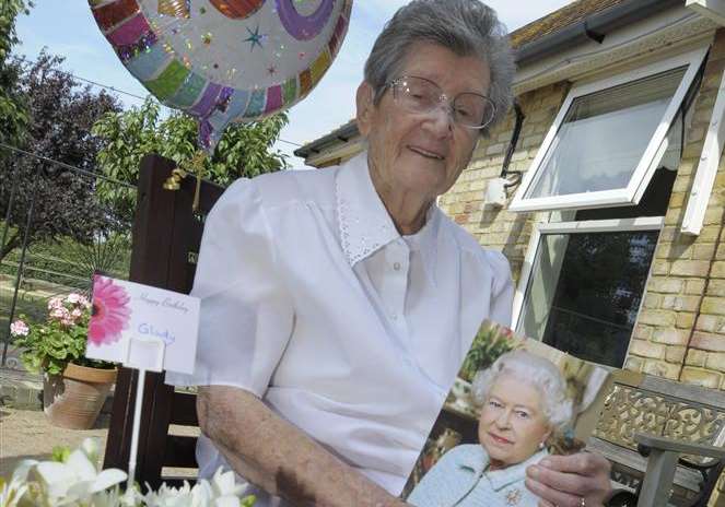 Glady celebrating with her telegram from The Queen