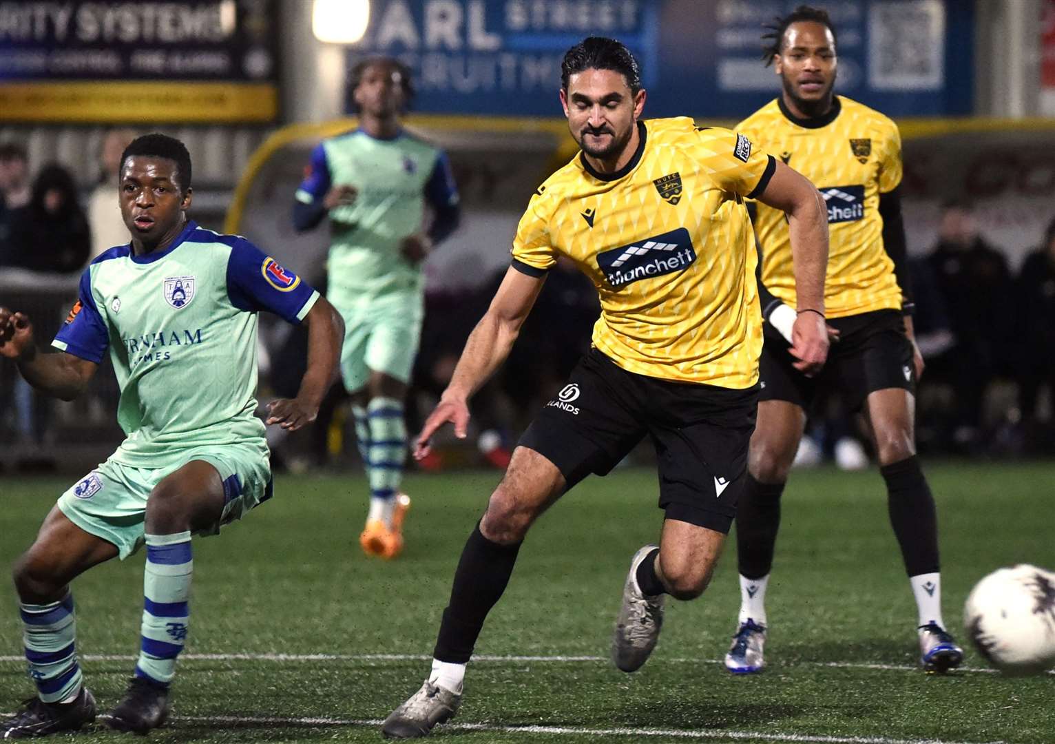 Maidstone left-back Harry Kyprianou eases clear of Mo Dabre. Picture: Steve Terrell