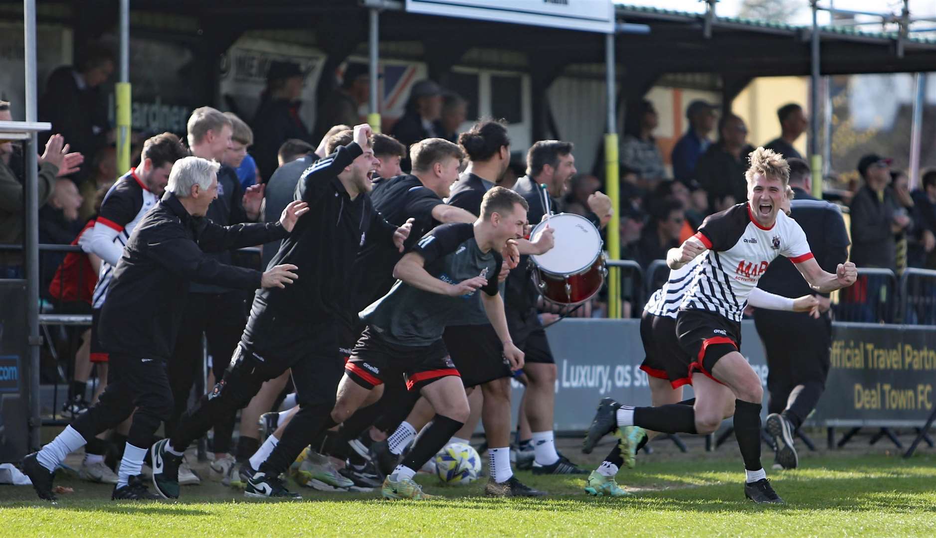 Champions Deal get their title-winning promotion party started at the full-time whistle after Saturday’s 3-1 home Southern Counties East Premier Division win against Lydd. Picture: Paul Willmott