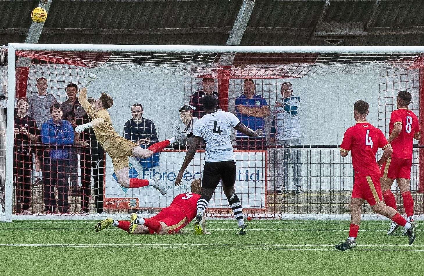 Whitstable goalkeeper Dan Colmer watches a shot from Dover's Jeremiah Gyebi go sailing over during Tuesday’s 2-2 draw. Picture: Les Biggs