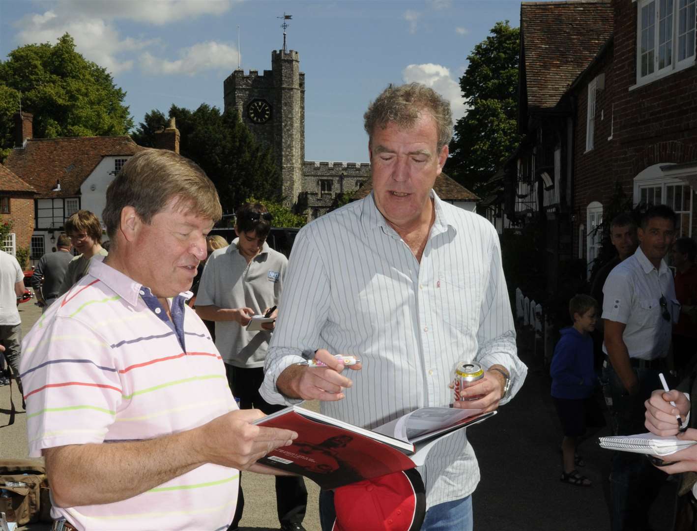 Pre-farmer Clarkson took a break from filming to sign autographs