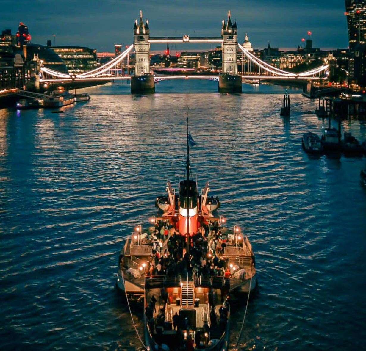 The Waverley steaming up the River Thames towards a flood-lit Tower Bridge in London. Picture: Waverley Excursions