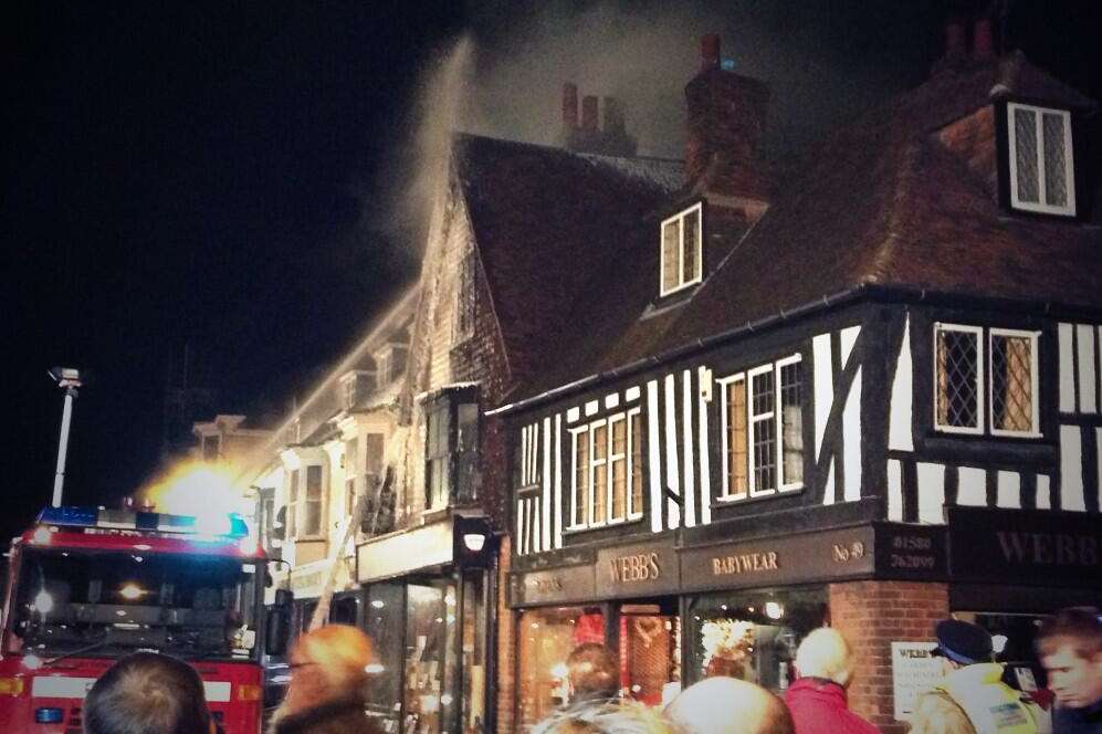 Foam is sprayed onto Webbs of Tenterden. Picture: Bill Ferguson