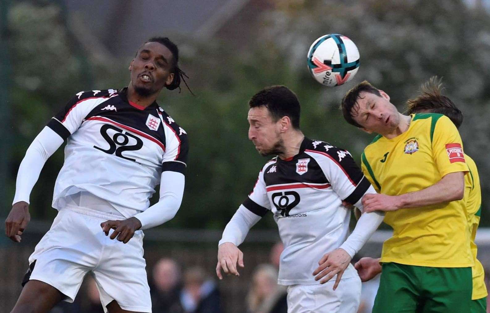 Corinthian clear their lines at Faversham as it finished 2-2 before they won 4-1 on penalties in their play-off semi-final on Tuesday night. Picture: Ian Scammell