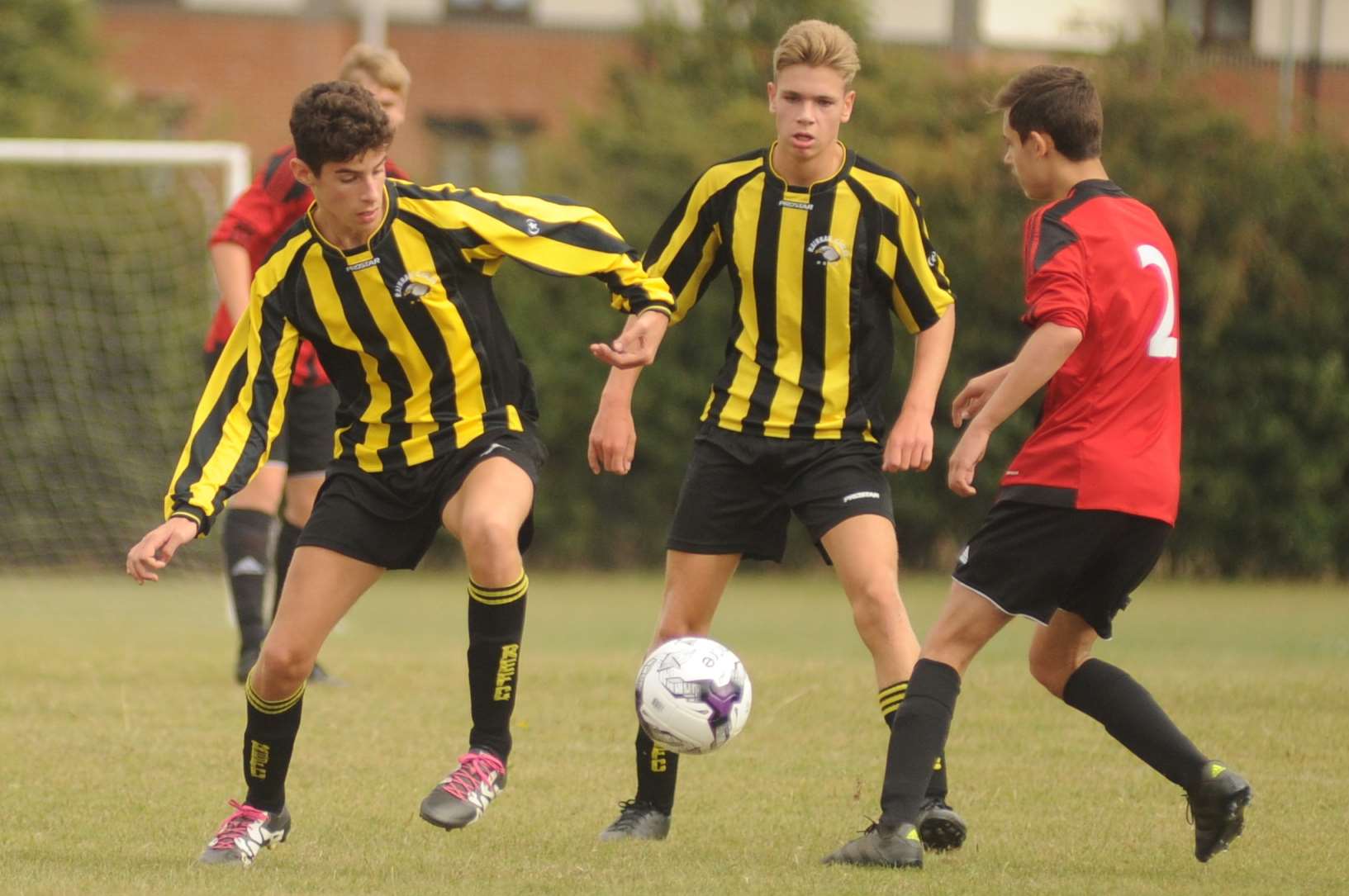 Under-18 sides Rainham Eagles and Woodcoombe Youth fight it out for a place in the second round of the League Cup Picture: Steve Crispe