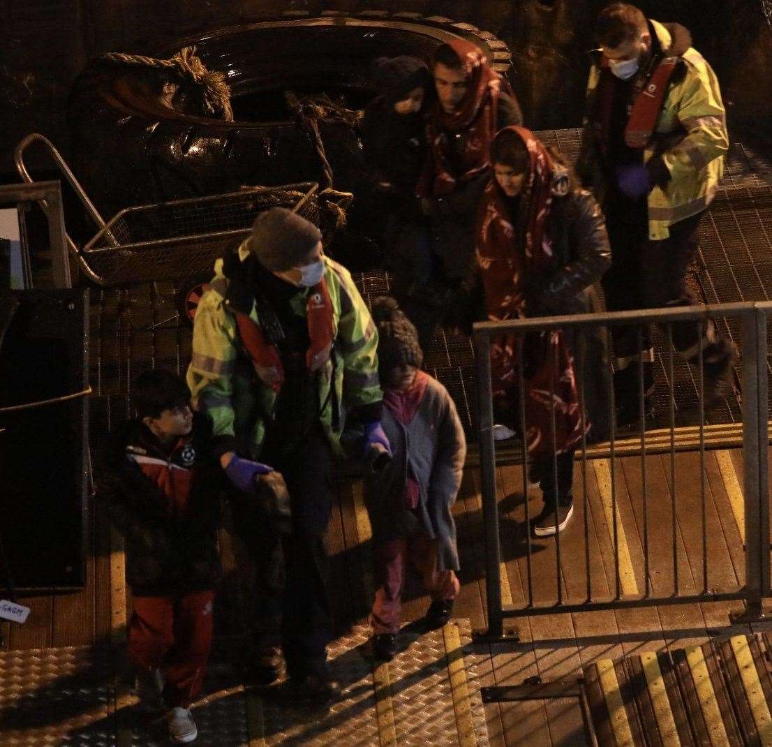 Migrants brought ashore by an RNLI rescue crew. Picture: UKNIP