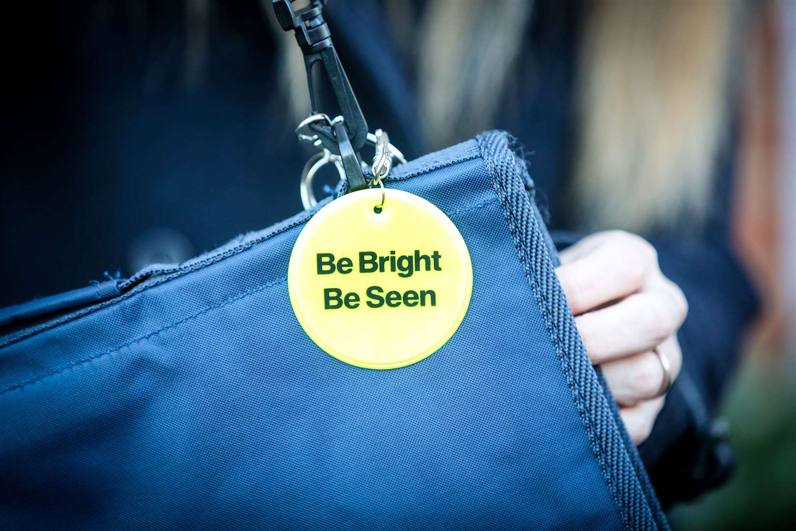 The keyrings can be clipped on coats and school book bags. Picture: Matthew Walker.