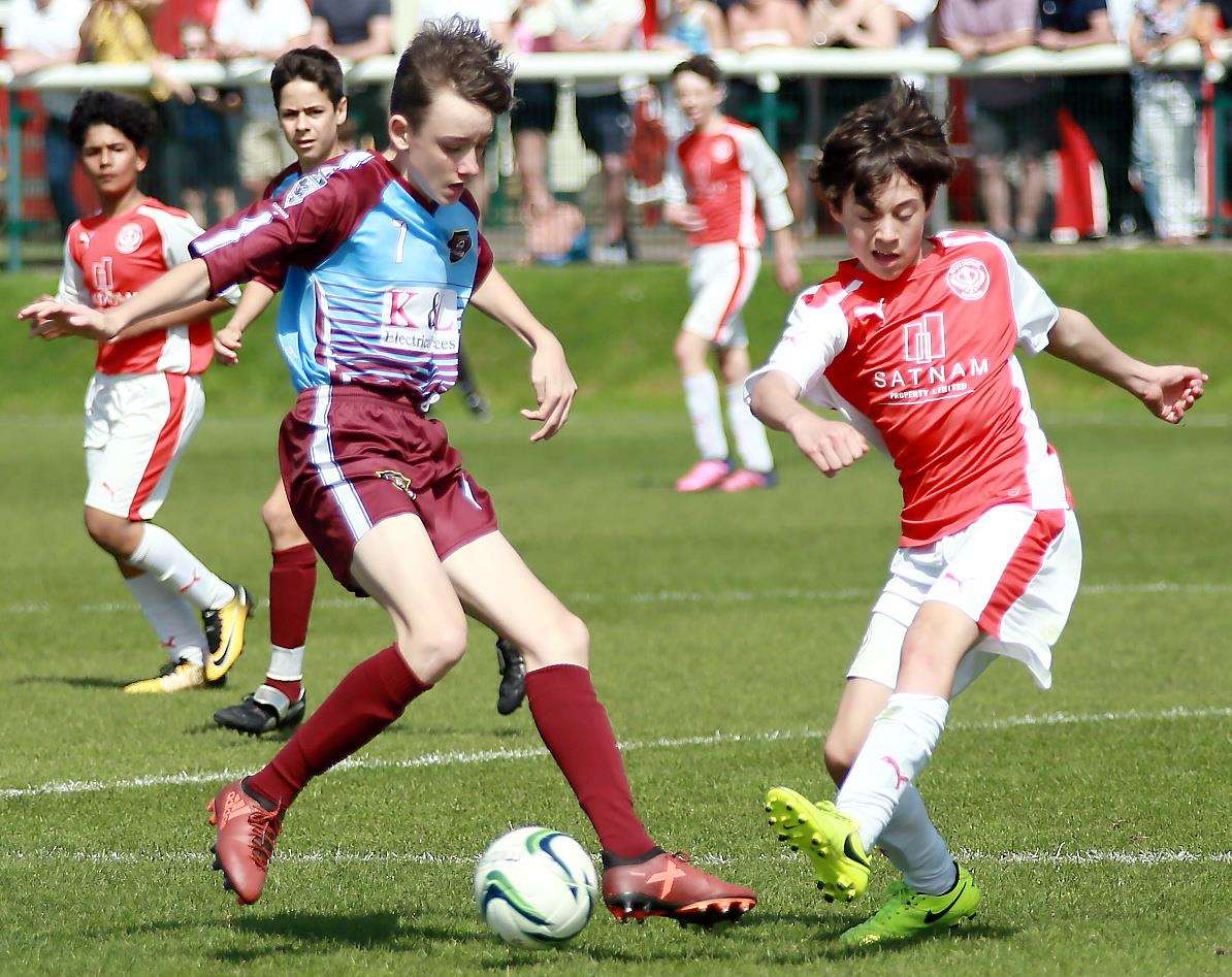 Punjab United (red) take on Wigmore Youth in the Under-13 League Cup final. Picture: Phil Lee FM1586703