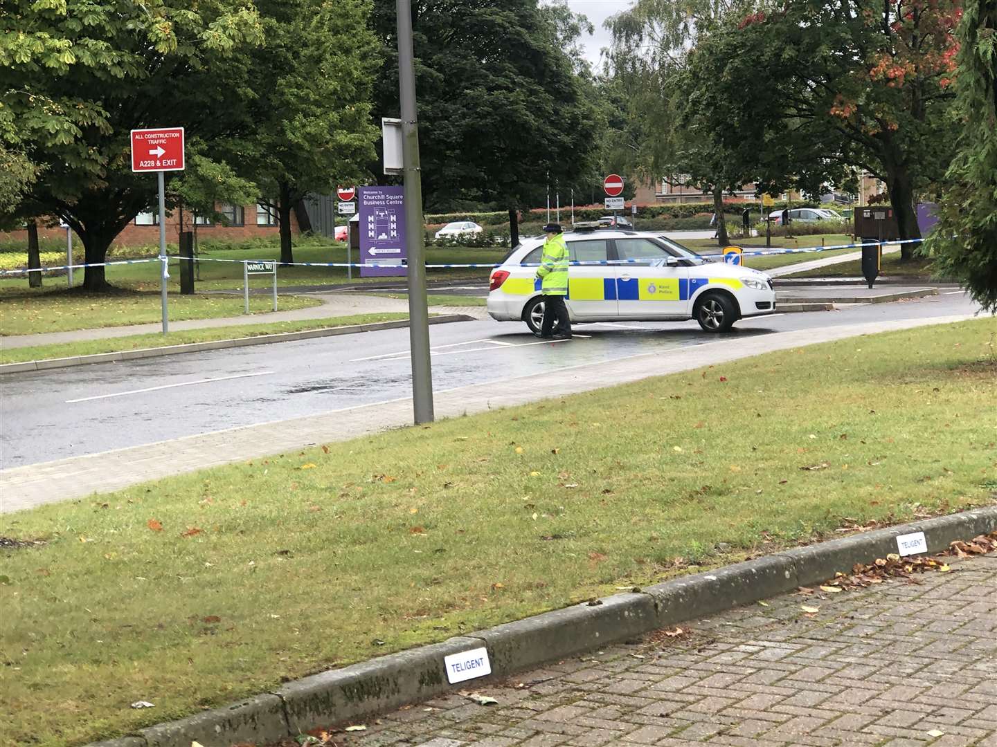 Police were blocking off the entrance to the building site