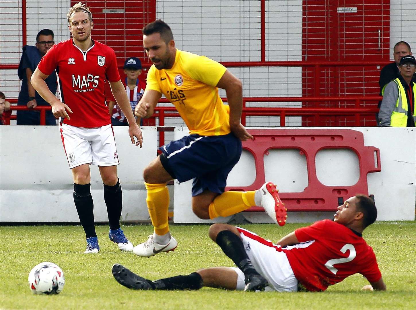 Chatham right-back Danny Grant makes a challenge against Camberley Picture: Sean Aidan