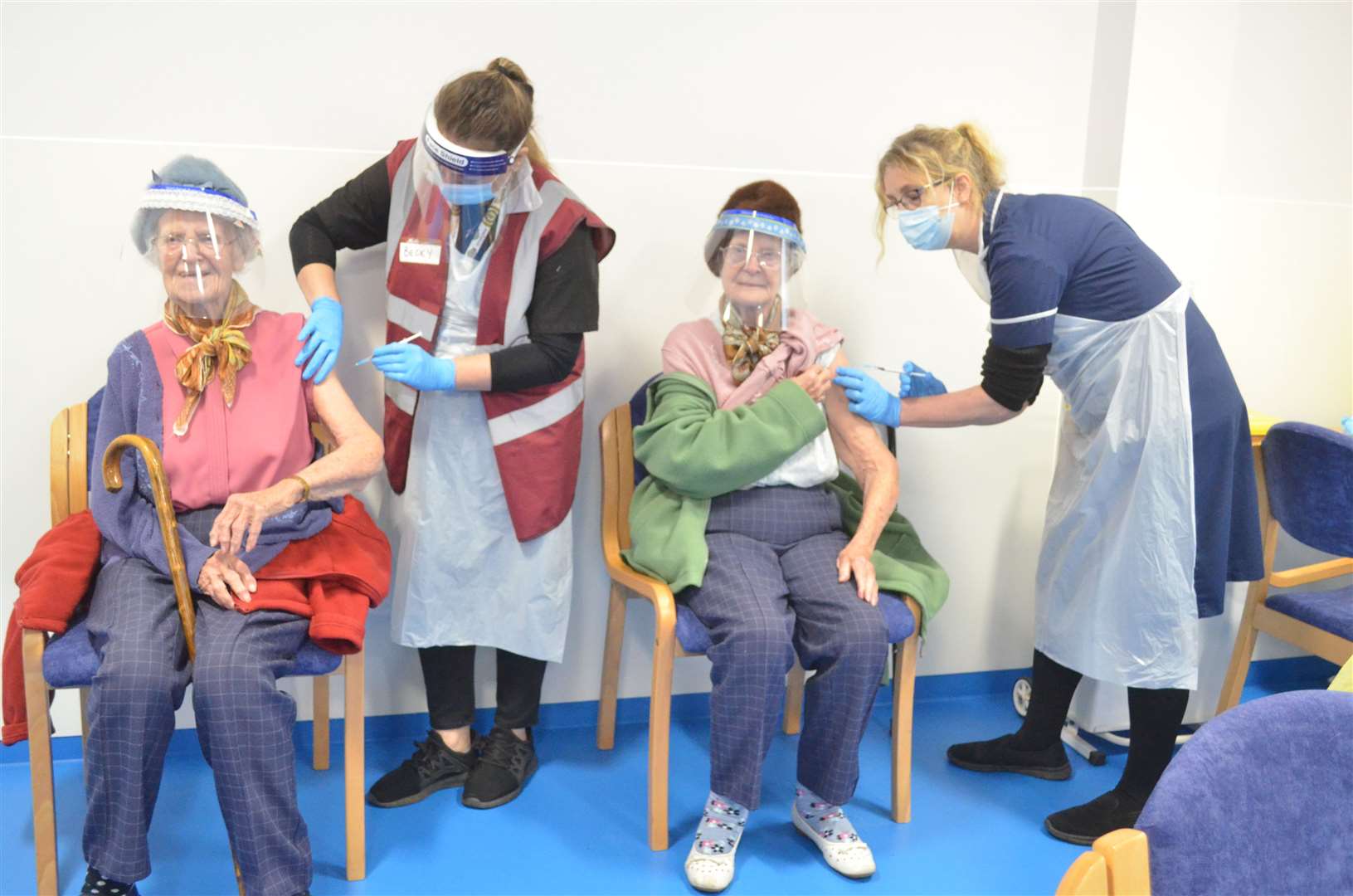 Twins Dorothy Sivyer and Kathleen Whitehead, from Medway, who are 100 both received their coronavirus vaccine jabs in Rochester. Picture: NHS Kent and Medway CCG