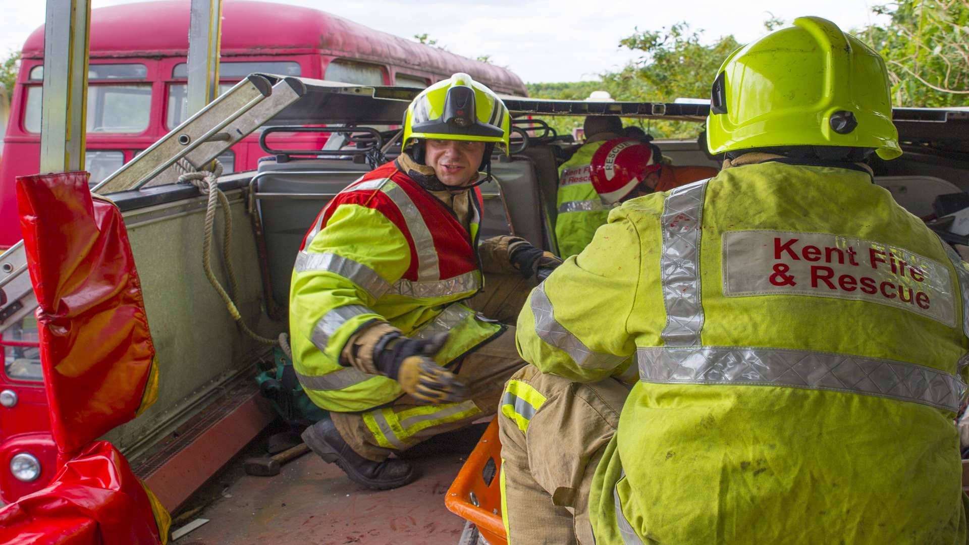 Firefighters on board the bus