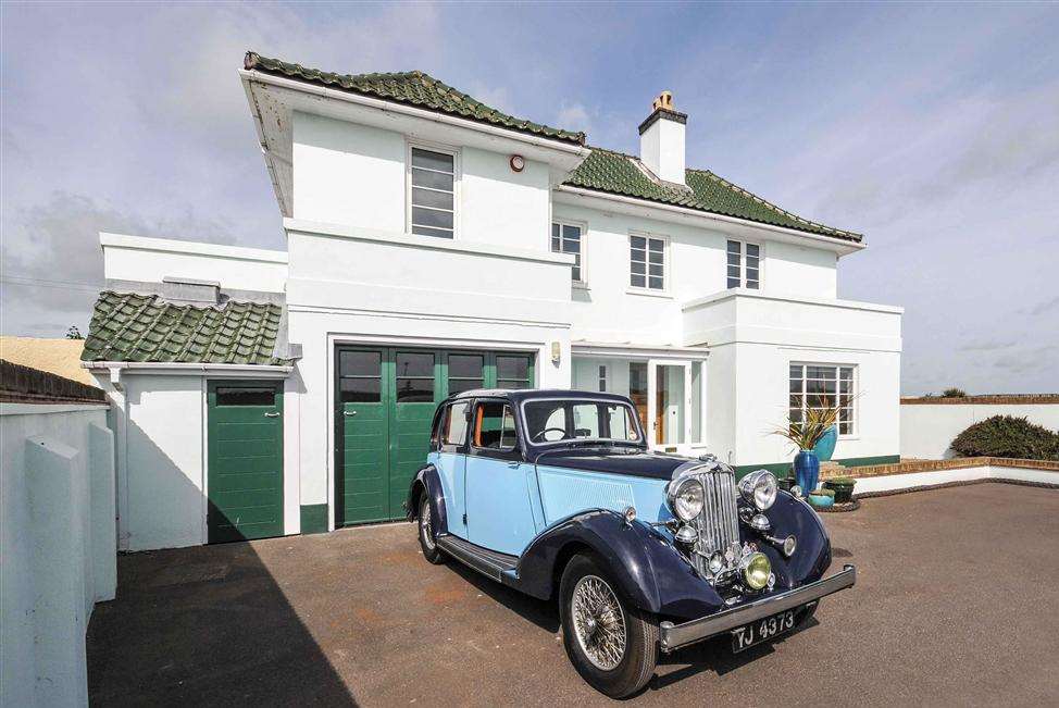 The vintage car is being offered along with Castle Lodge