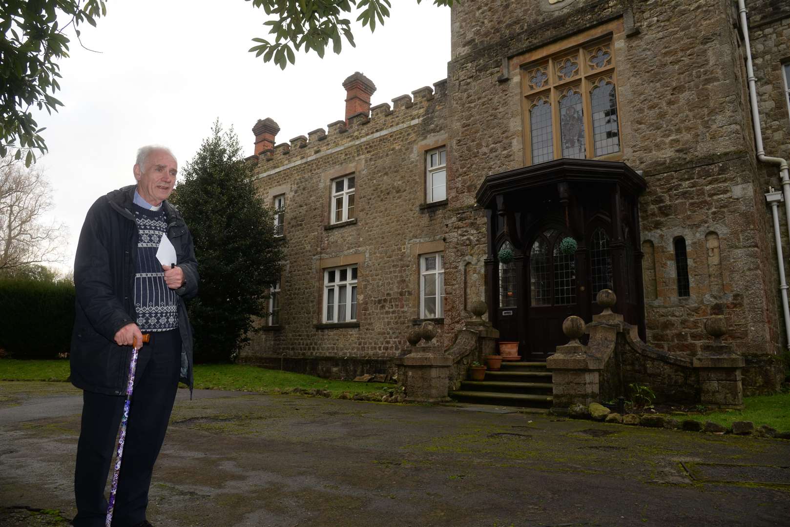 Father Peter Soper outside The Hermitage, his home for the past 20 years in the grounds of St Thomas More RC Church, West Malling. Picture: Chris Davey (25284639)