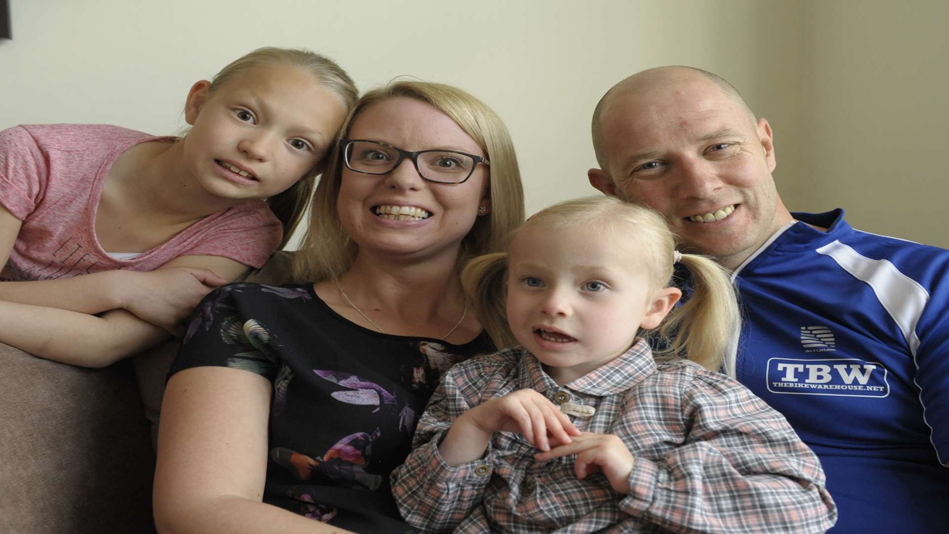 Lee and Michelle Calvert with Hannah, 8, and Grace, 4. Picture: Steve Crispe