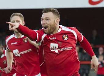 Billy Bricknell spins around after scoring the Fleet second from the penalty spot. Picture: Andy Payton.