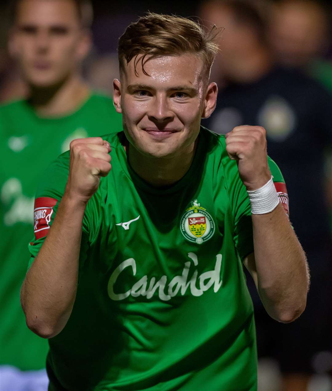 Ashford’s Jack Saunders celebrates after their FA Cup preliminary round replay win over Harrow Borough. Picture: Ian Scammell