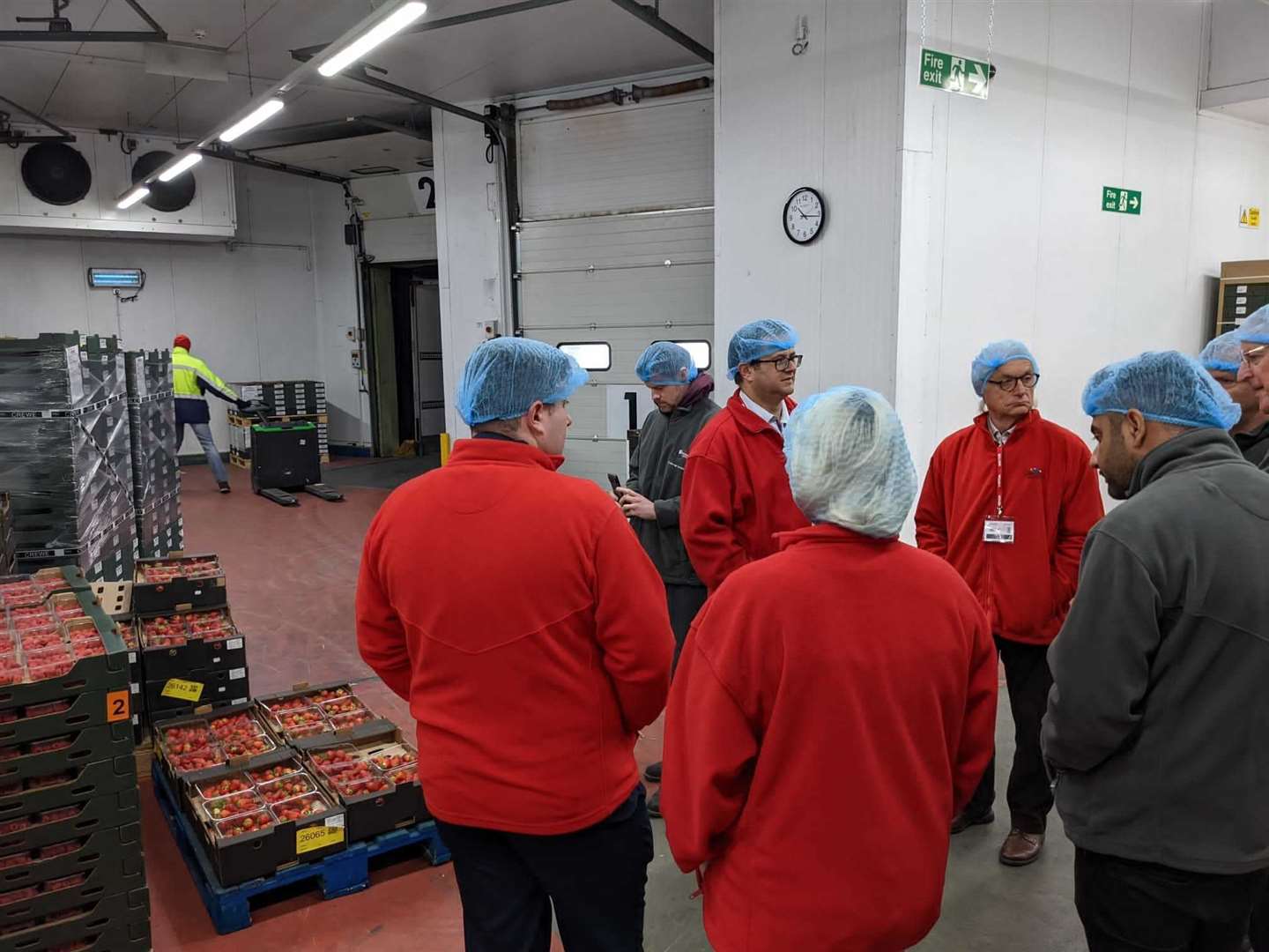 The trade commissioners chat to staff at Winterwood Farms