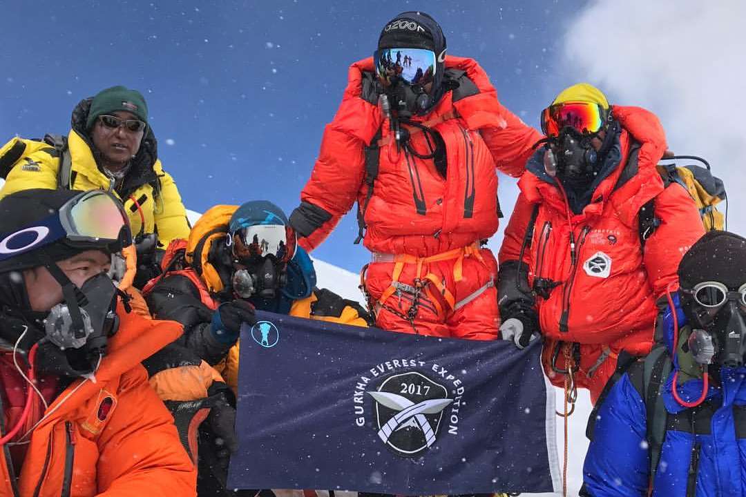 Gurkhas and their Sherpas take a well-earned rest after reaching the top of Mount Everest. Picture: Gurkha Everest Expedition 2017