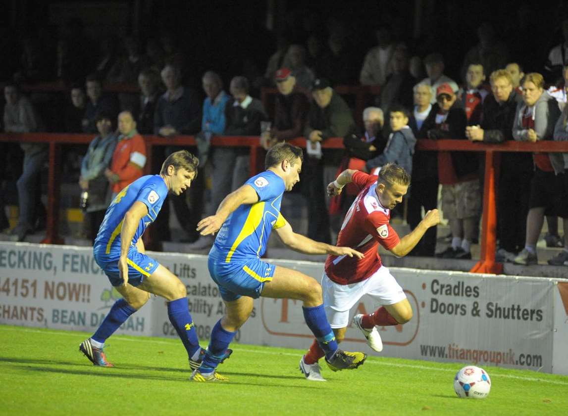 Matt Godden escapes the attentions of two Concord defenders Picture: Steve Crispe