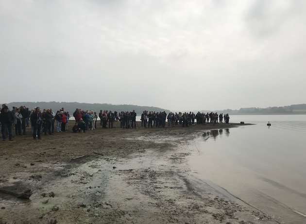 Crowds gather to watch the Bluebird