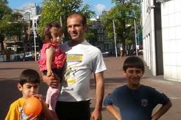 Abdul Mosa with children Arda Mosa (dad holding), Ara Mosa (left) and Alin Mosa (right) who died in the crash. Picture: Rossparry.co.uk/SWNS.com