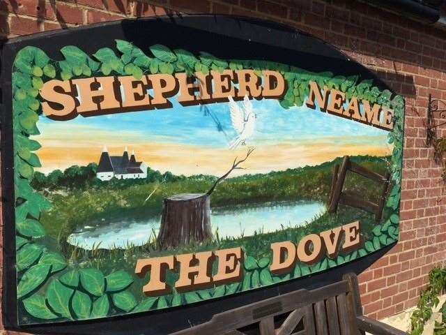 There’s an old-style painted pub sign at the front and a bench for any punters who fancy a seat to watch the traffic pass by in the lane