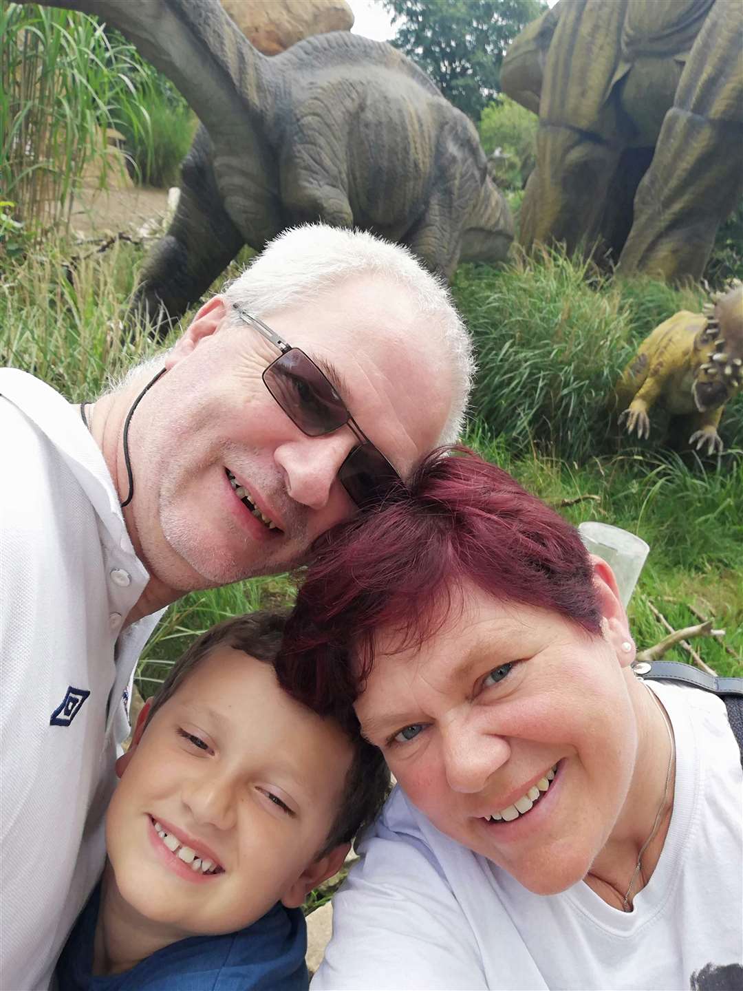 Helen Baker with her husband Chris and son Sam (Family handout/PA)