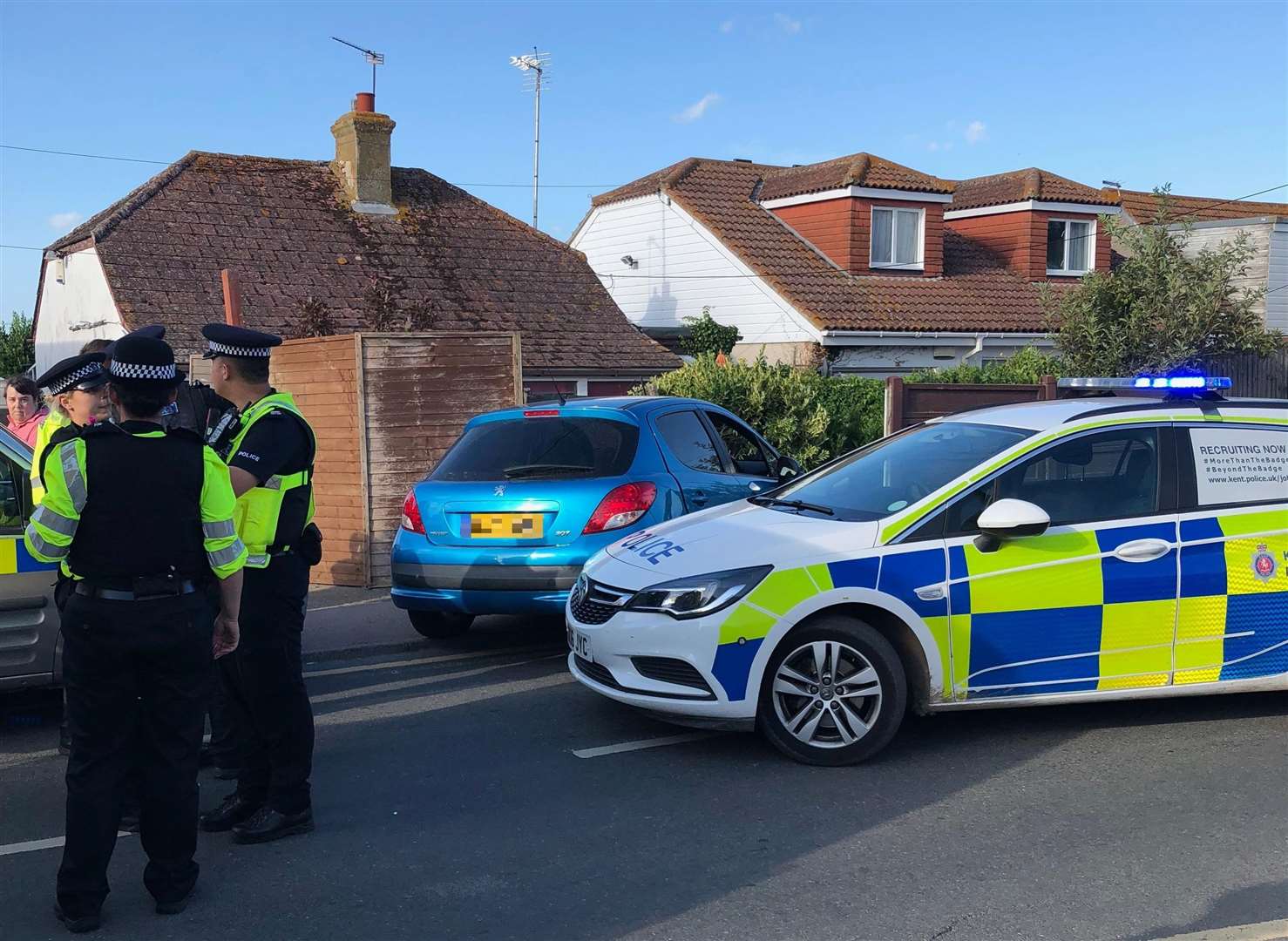 Police next to the Peugeot which crashed on Leysdown Road