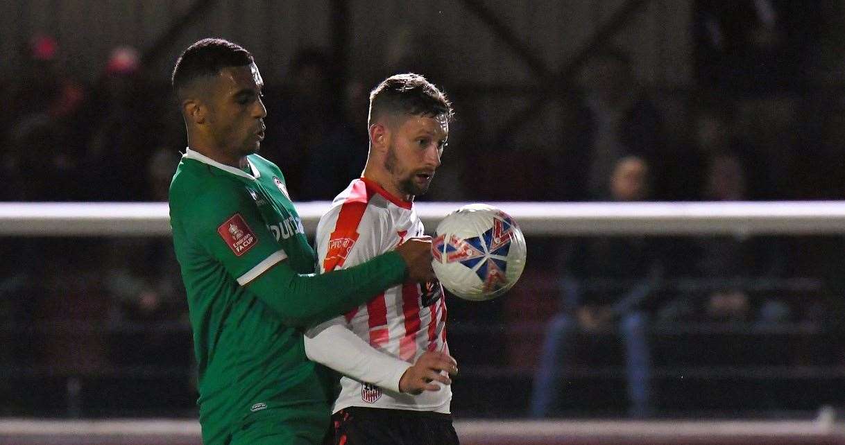 Sheppey striker Dan Bradshaw keeps the ball under pressure. Picture: Marc Richards