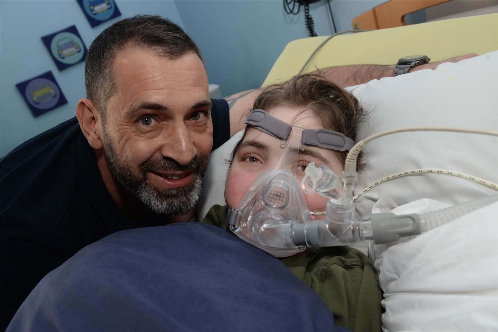 Adrian Rafferty and his son Jacob, 15 at Demelza House in Bobbing. Picture: Chris Davey