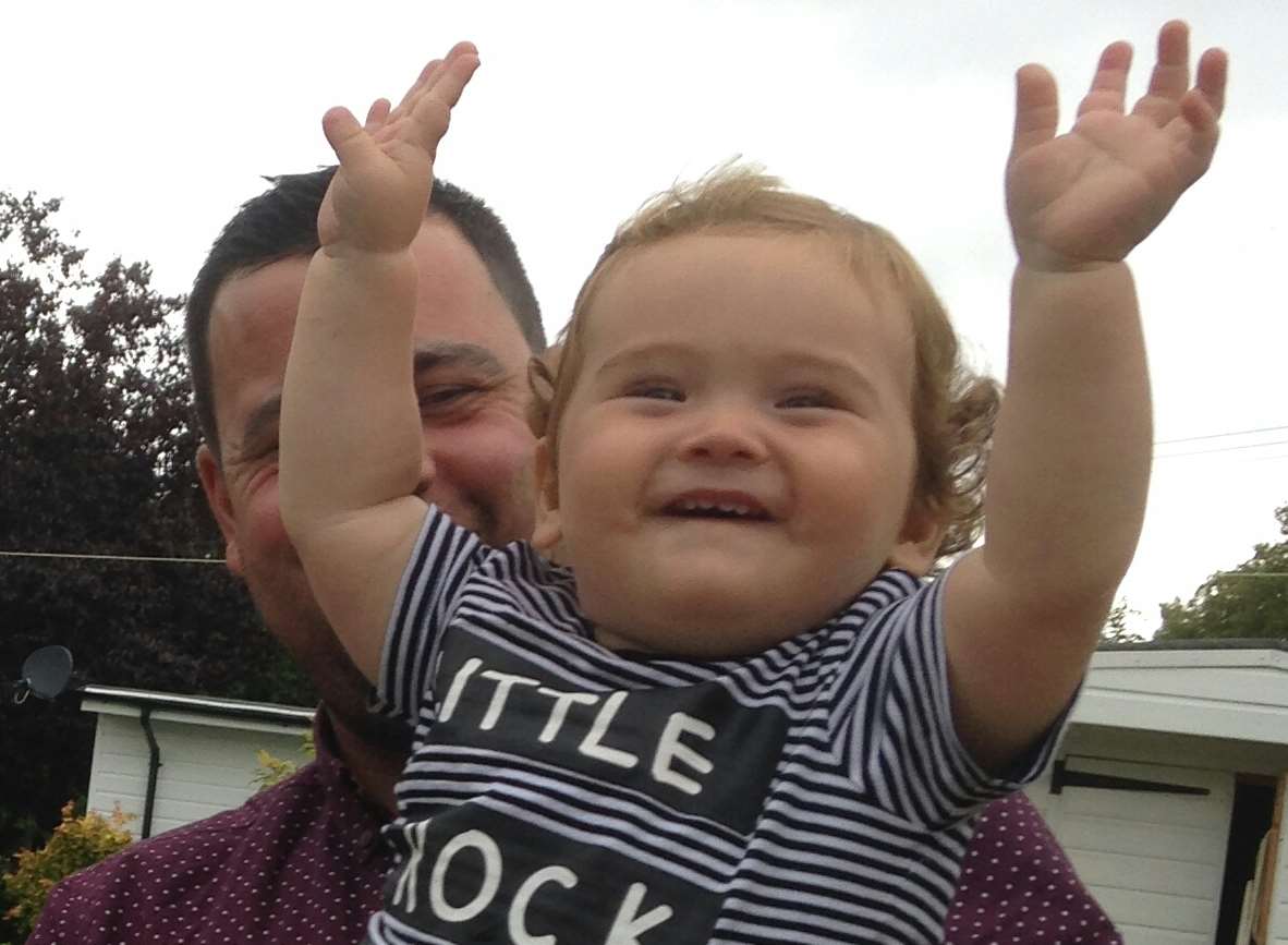 Brodie Bedwell is pictured happy and smiling at a family barbecue just hours before his parents realised something was wrong