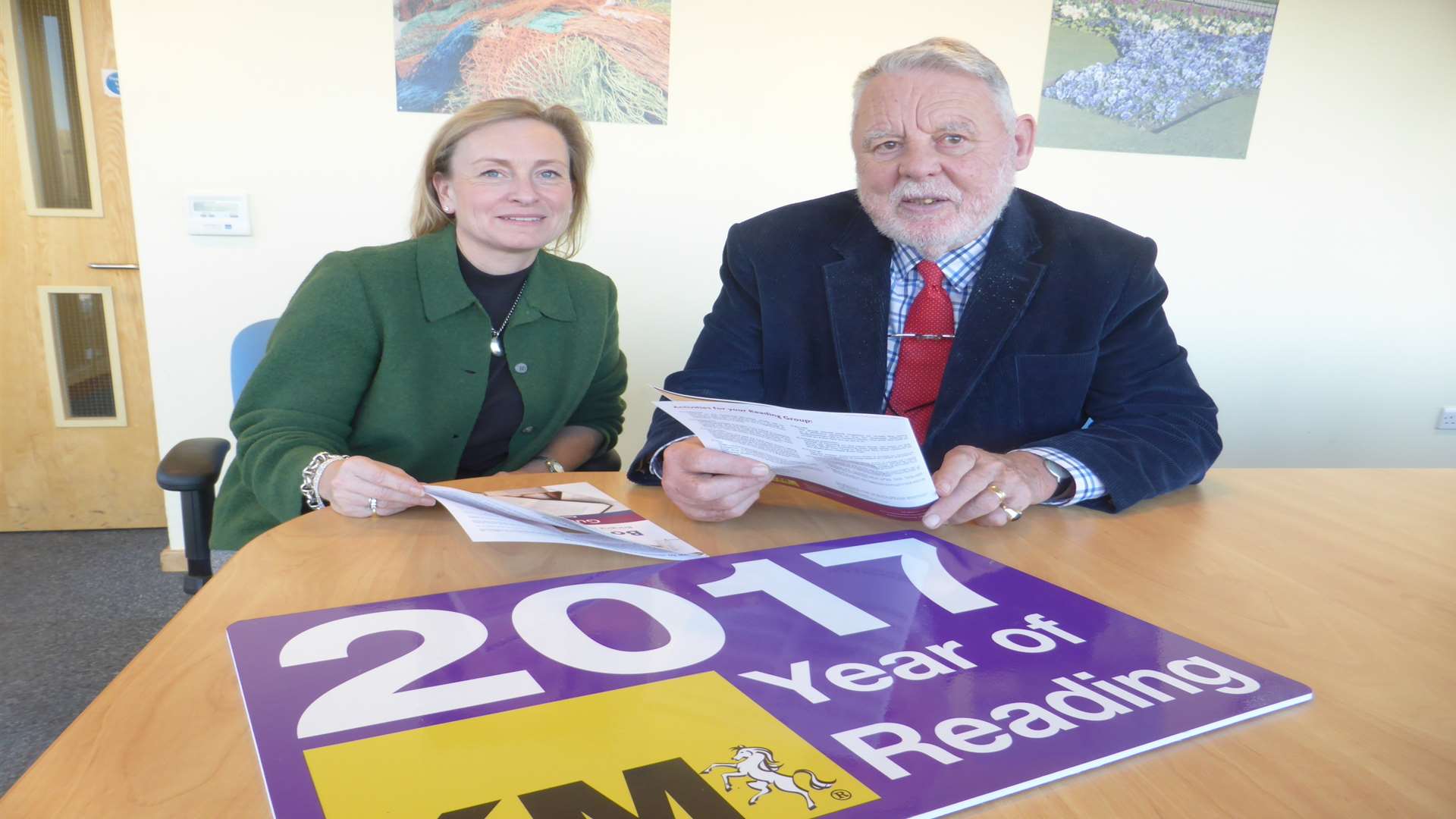 Terry Waite is briefed by KM Group chairman Geraldine Allinson on KM's Year of Reading campaign and announces his decision to become Honorary Patron of the KM Charity Team..