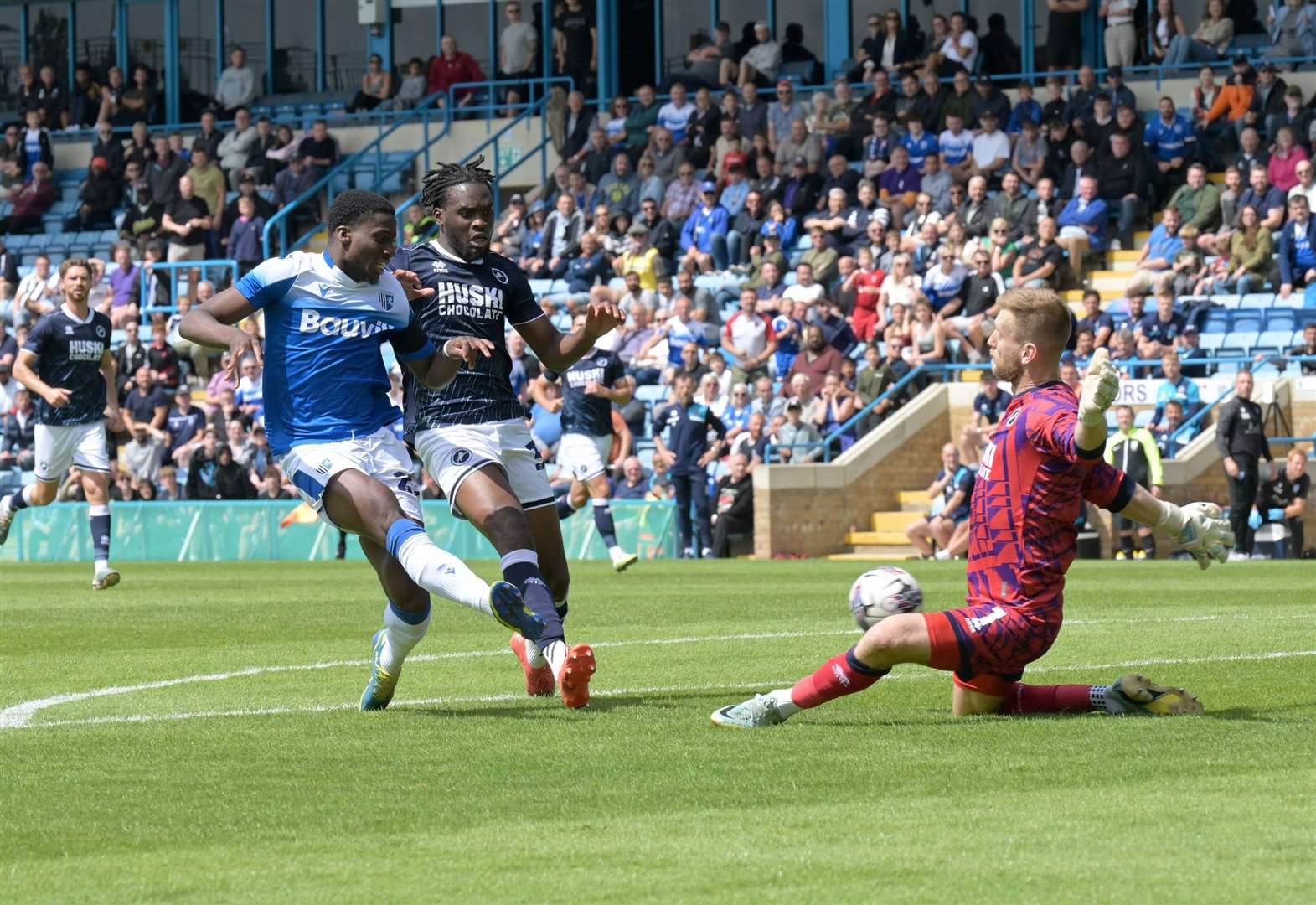 Joe Gbode is denied by goalkeeper George Long Picture: Keith Gillard