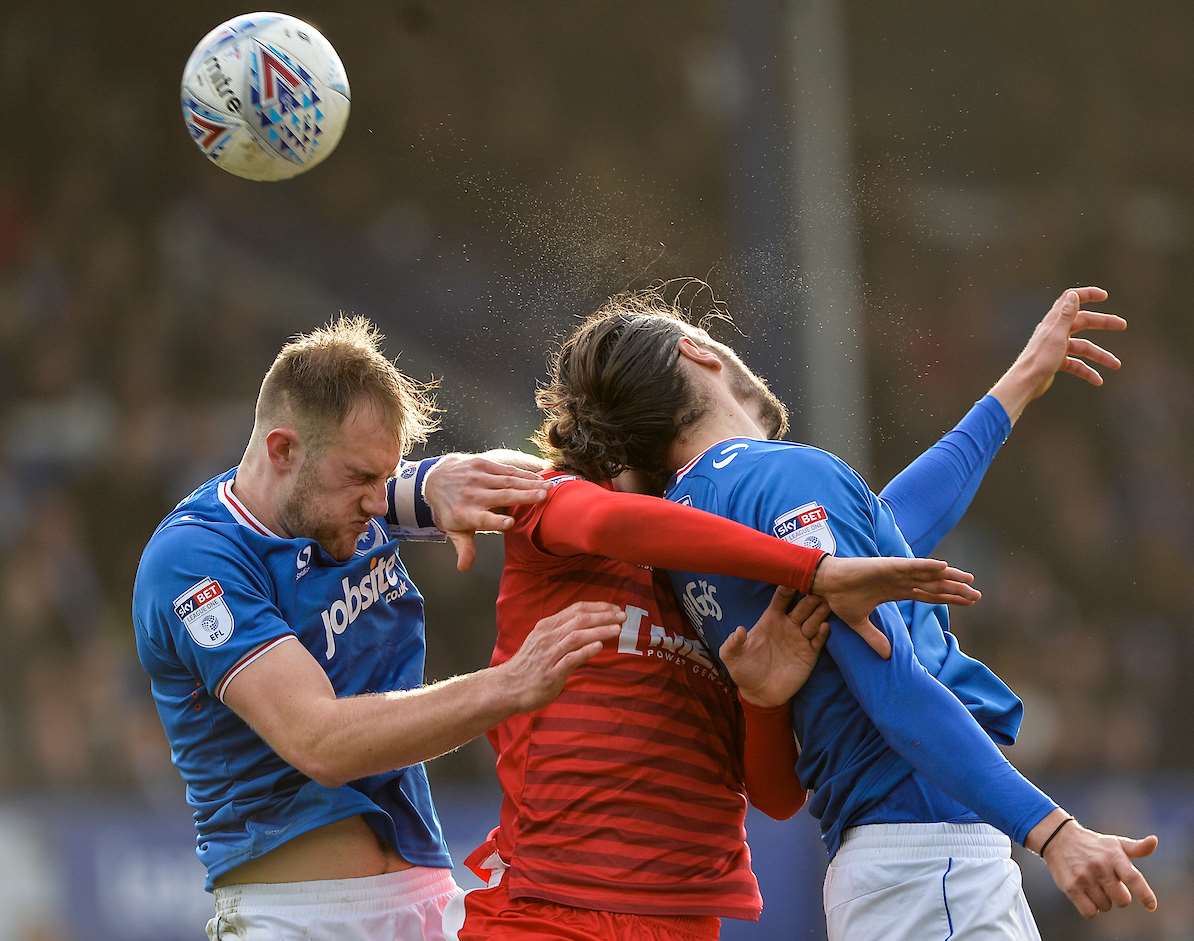 Conor Wilkinson challenges for the ball Picture: Ady Kerry